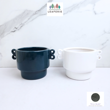 Load image into Gallery viewer, The Leaferie Mochi flowerpot. 2 colours blue and white ceramic pot with handle.