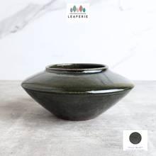 Load image into Gallery viewer, The Leaferie Xyla dark green shallow pot. ceramic material