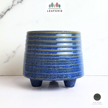 Load image into Gallery viewer, The Leaferie Viola blue ceramic pot with leg