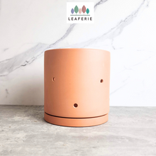 Load image into Gallery viewer, The Leaferie terracotta E Pot with holes. comes in 2 sizes