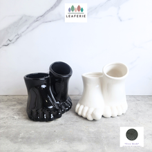 Load image into Gallery viewer, The Leaferie Stomy foot black and white ceramic pot.