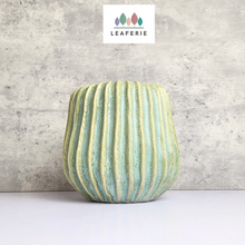 Load image into Gallery viewer, The Leaferie Gotilda green plant pot. ceramic planter. front view