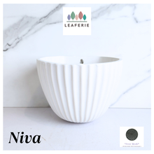 Load image into Gallery viewer, Niva Wall Hanging white ceramic Pot 'LEAFERIE' branding on a marble background