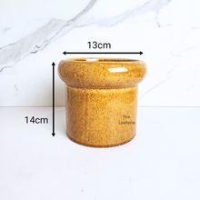 Load image into Gallery viewer, The Leaferie Greta orange flowerpot. ceramic material