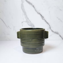 Load image into Gallery viewer, The Leaferie Aizen plant pot. 3 colours, red , green and white. ceramic pots. front view of green colour