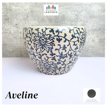 Load image into Gallery viewer, Aveline Ceramic planter with blue floral pattern on a gray background, featuring the Leaferie brand.