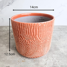 Load image into Gallery viewer, The Leaferie Roselle red / orange ceramic pot with leaf imprint.