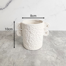 Load image into Gallery viewer, The Leaferie Nover white ceramic pot with ear