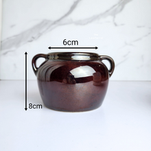 Load image into Gallery viewer, The Leaferie Campbell dark maroon flowerpot with ears. ceramic material