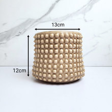 Load image into Gallery viewer, The Leaferie Bronwyn studded beige flowerpot. ceramic material