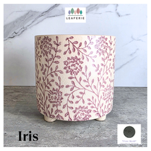 Load image into Gallery viewer, Iris planter with floral pattern on a marble surface, featuring the brand 'LEAFERIE'.