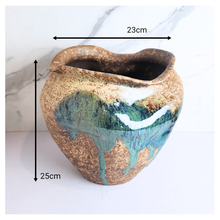 Load image into Gallery viewer, Raku ceramic vase with gold and blue glaze on a white background, featuring the Leaferie brand.