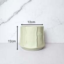 Load image into Gallery viewer, The Leaferie Leo green flowerpot. ceramic material
