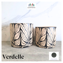 Load image into Gallery viewer, Verdelle Two ceramic pots with leaf pattern on a gray surface, branded 'LEAFTERIE'.