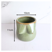 Load image into Gallery viewer, Green ceramic planter with dimensions labeled on a white background