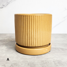 Load image into Gallery viewer, The Leaferie Madigan yellow flowerpot with matching tray. ceramic material. Design A