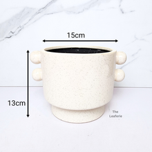 Load image into Gallery viewer, The Leaferie Lyra white ceramic pot with 2 buttons at the side