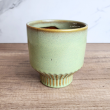 Load image into Gallery viewer, The Leaferie Bairn green flowerpot. ceramic material