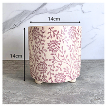 Load image into Gallery viewer, Iris planter with floral pattern on a marble surface, featuring the brand 'LEAFERIE'.