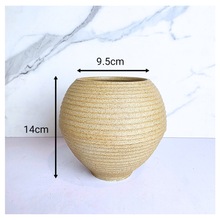 Load image into Gallery viewer, Leaferie Yuri Beige textured vase labeled 'Yuri' on a white background with 'LEAFERIE' branding.