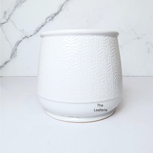 Load image into Gallery viewer, The Leaferie Nordman white ceramic pot with small imprinted design.
