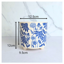 Load image into Gallery viewer, Boreal Ceramic planter with blue floral pattern on a light gray background, featuring the brand 'LEAFAERIE'.