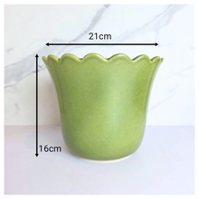 Load image into Gallery viewer, Marrel Green ceramic planter with scalloped edge on a light background, featuring the LEAFERIE brand.