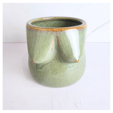 Load image into Gallery viewer, Green ceramic mug with gold rim on a white background