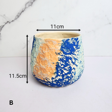 Load image into Gallery viewer, The Leaferie Huda flowerpot. colourful rainbow ceramic pot