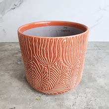 Load image into Gallery viewer, The Leaferie Roselle red / orange ceramic pot with leaf imprint.
