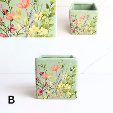 Load image into Gallery viewer, Green rectangular planter with floral design on a white background