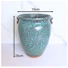 Load image into Gallery viewer, Oro Speckled green ceramic vase with 'LEAFAERIE' branding on a white background