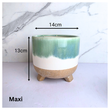 Load image into Gallery viewer, Lumea Ceramic planter with green and beige gradient on a marble background, featuring the brand 'LEAFERIE'.