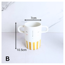 Load image into Gallery viewer, Dorei Two pots with polka dot and striped design on a marble background, featuring the LEAFERIE brand.