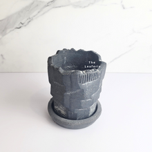 Load image into Gallery viewer, The Leaferie Yngvild terracotta pot with tray. Rustic and rugged planter. front view. Black colour