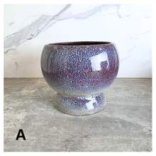 Load image into Gallery viewer, Olea Two ceramic pots with speckled purple glaze and white finish on a marble surface, featuring the Leaferie brand.