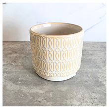 Load image into Gallery viewer, Toby white pot with gold patterns on a gray surface, featuring the Leaferie brand.