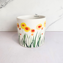 Load image into Gallery viewer, planter with floral design on a white background
