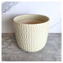 Load image into Gallery viewer, Vesper Beige ceramic pot with geometric pattern on a marble surface, featuring the LEAFAERIE brand.