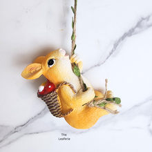 Load image into Gallery viewer, Pip Hanging Decoration .Two decorative items, a yellow mouse and a yellow duck, on a swing with 'LEAFERIE' branding.