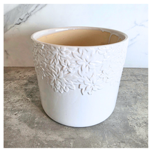 Load image into Gallery viewer, Mason White ceramic planter with floral patterns on a marble surface, featuring the Leaferie brand.