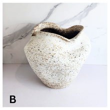Load image into Gallery viewer, Raku ceramic vase with gold and blue glaze on a white background, featuring the Leaferie brand.