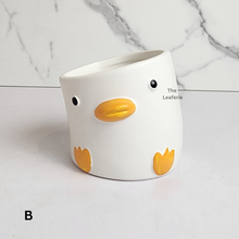 Load image into Gallery viewer, The Leaferie Odell flowerpot . 2 designs pink and white ceramic pot.