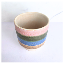 Load image into Gallery viewer, Tetra Ceramic cup with multicolored stripes on a light background, featuring the brand 'LEAFAERIE'.