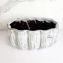 Load image into Gallery viewer, Decorative ceramic planter with black interior on a white background