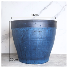 Load image into Gallery viewer, Blue planter with dimensions labeled on a marble background