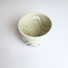 Load image into Gallery viewer, The Leaferie Tymo white pot. wavy design and ceramic material