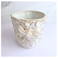 Load image into Gallery viewer, Handmade Elio Decorative ceramic pot with dragonfly design on a marble background, featuring the brand 'LEAFERIE'.