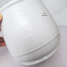 Load image into Gallery viewer, The Leaferie Nordman white ceramic pot with small imprinted design.