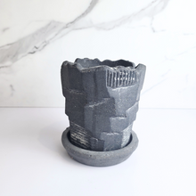 Load image into Gallery viewer, The Leaferie Yngvild terracotta pot with tray. Rustic and rugged planter. front view. Black colour